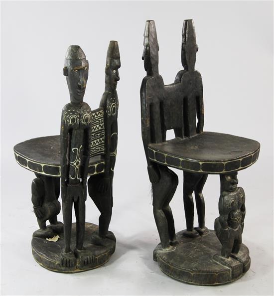 Sepik River - near pair of male & female figural chairs